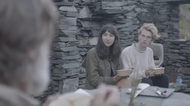 The three share lunch outside the bothy.